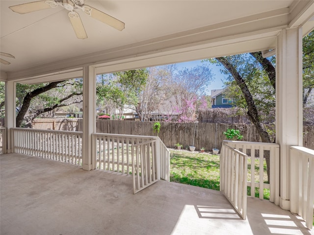 view of patio / terrace with a fenced backyard and a ceiling fan