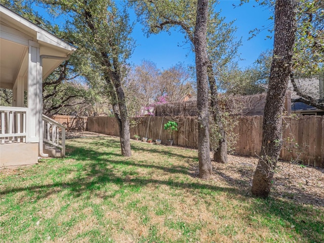 view of yard featuring a fenced backyard