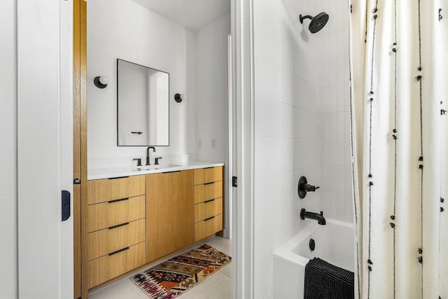 full bathroom featuring shower / bath combo and vanity