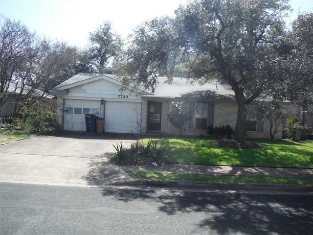 7729 Croftwood Dr, Austin, TX 78749 - single story home with a garage, concrete driveway, a front yard, and brick siding