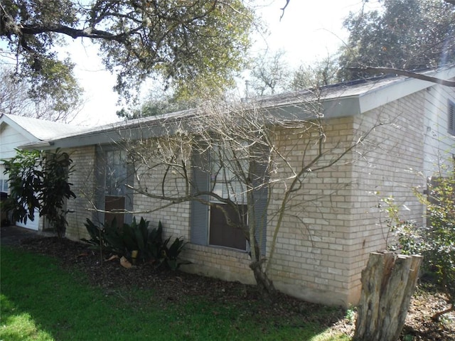 view of front of house with brick siding