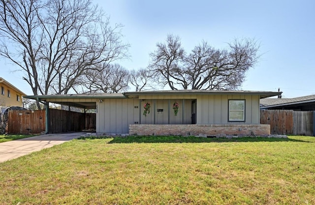 5303 Kings Hwy, Austin, TX 78745 - ranch-style home with driveway, brick siding, board and batten siding, and a carport
