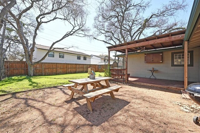 5303 Kings Hwy, Austin, TX 78745 - view of yard featuring outdoor dining space, a patio area, and a deck