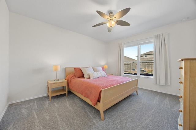 bedroom with carpet, baseboards, and ceiling fan