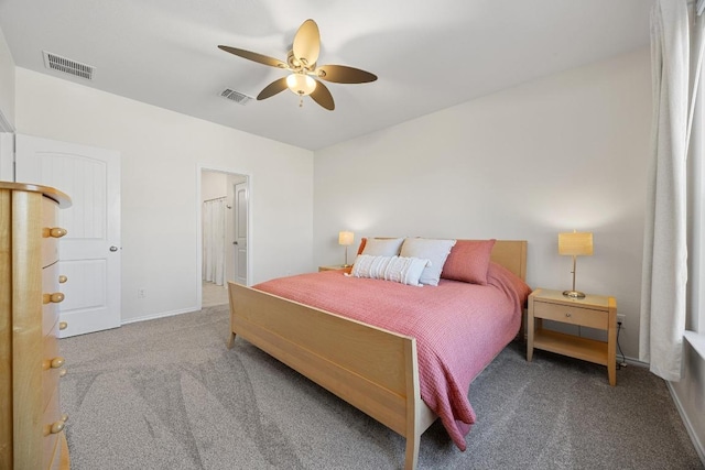 bedroom featuring visible vents, carpet floors, and ceiling fan