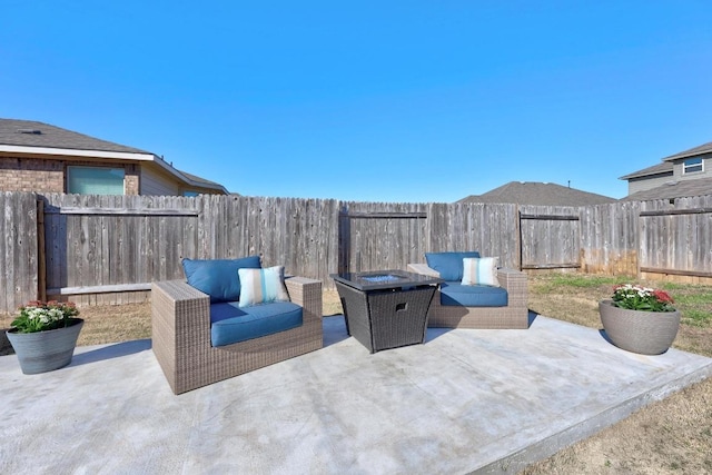 view of patio with an outdoor hangout area and a fenced backyard