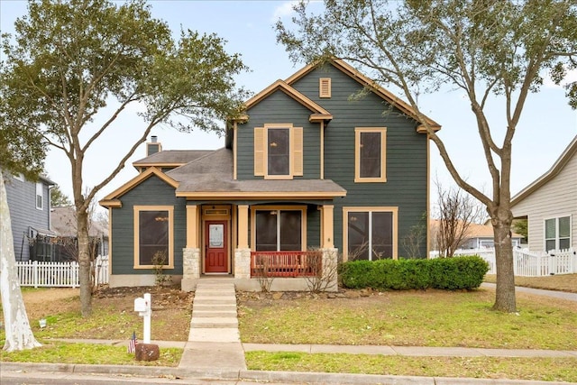 157 Mcgarity, Kyle, TX 78640 - traditional-style home featuring a porch and a chimney
