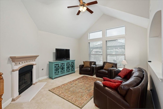 157 Mcgarity, Kyle, TX 78640 - living room featuring light carpet, ceiling fan, a fireplace with raised hearth, high vaulted ceiling, and baseboards