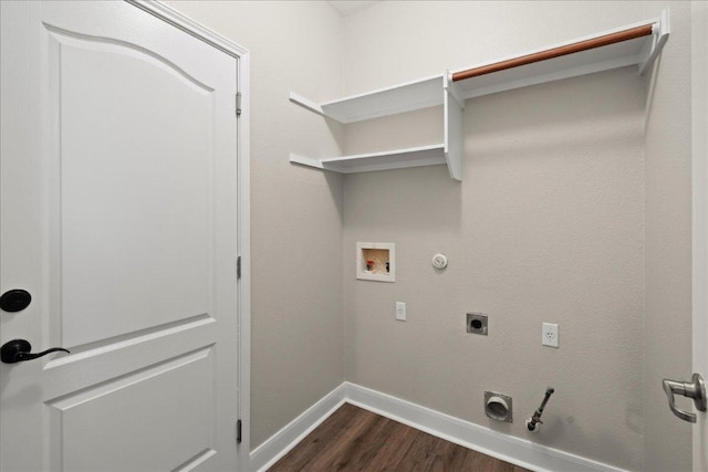 157 Mcgarity, Kyle, TX 78640 - washroom with hookup for a gas dryer, dark wood-type flooring, hookup for an electric dryer, and washer hookup