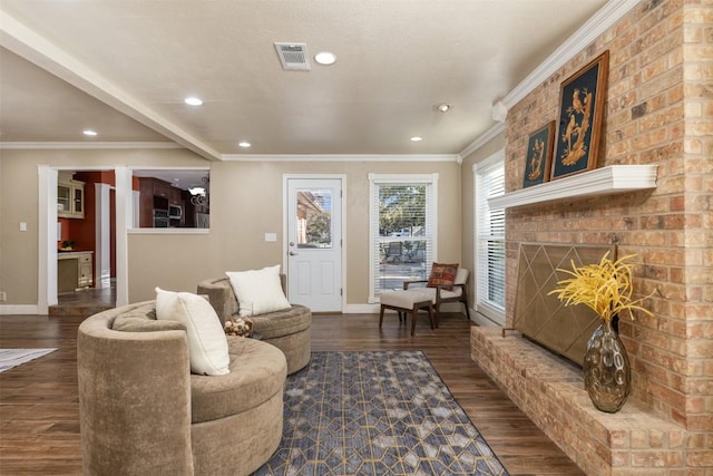 living room featuring crown molding, baseboards, visible vents, and dark wood-style flooring