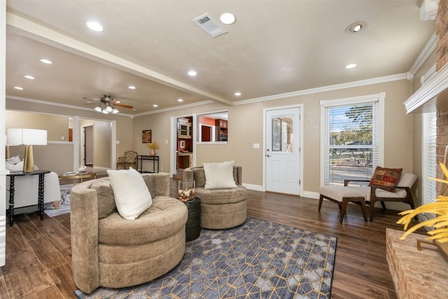 living area with a ceiling fan, baseboards, visible vents, dark wood finished floors, and ornamental molding