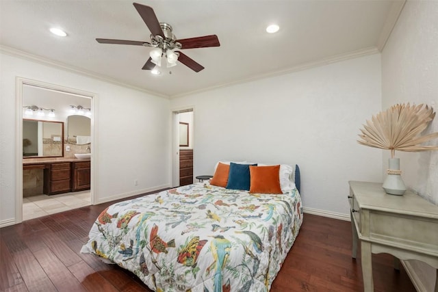 bedroom featuring recessed lighting, wood finished floors, baseboards, and ornamental molding