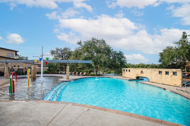 community pool with a patio