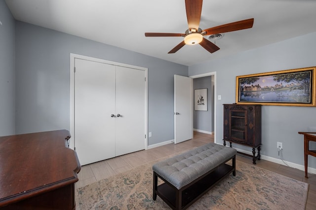 2709 Cascade Dr, Austin, TX 78757 - living area with ceiling fan and wood finished floors