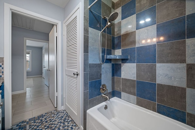 2709 Cascade Dr, Austin, TX 78757 - bathroom with shower / washtub combination and baseboards