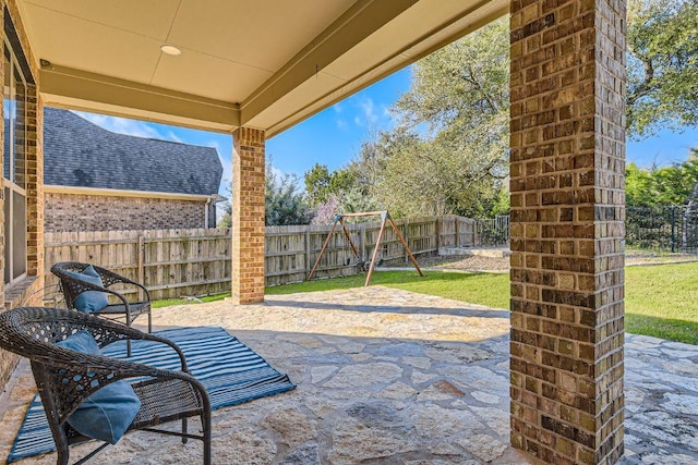 view of patio with a fenced backyard