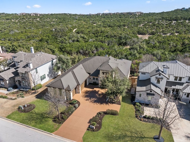 aerial view with a wooded view