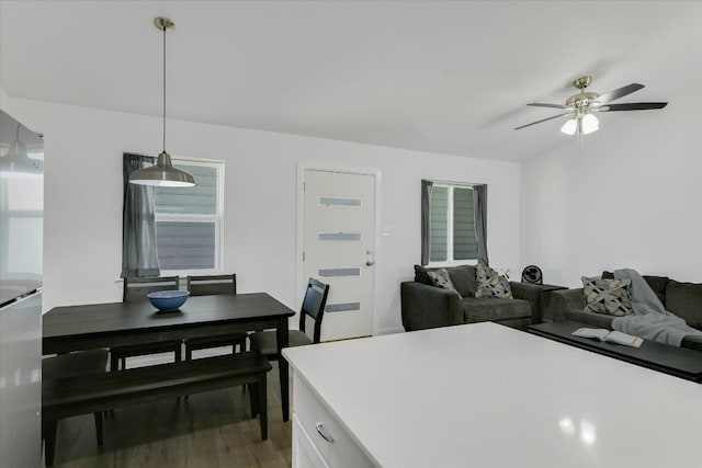 710 W 34th St Unit 205, Austin, TX 78705 - living area with a ceiling fan, light wood-type flooring, and healthy amount of natural light