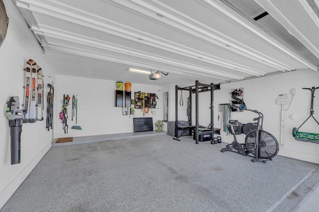 exercise room with a garage