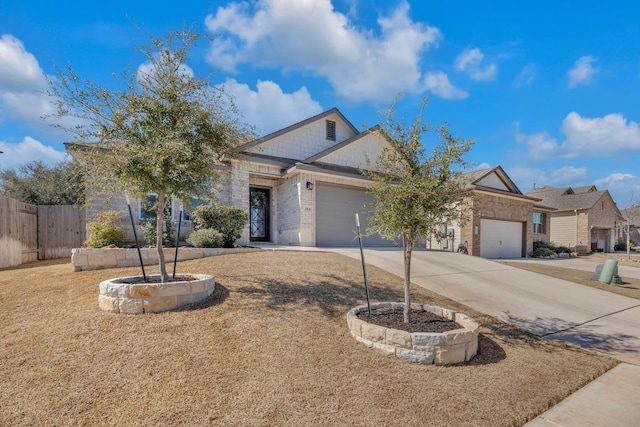 ranch-style house featuring a garage, brick siding, concrete driveway, and fence