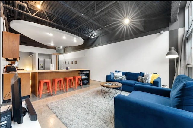 living room with finished concrete floors