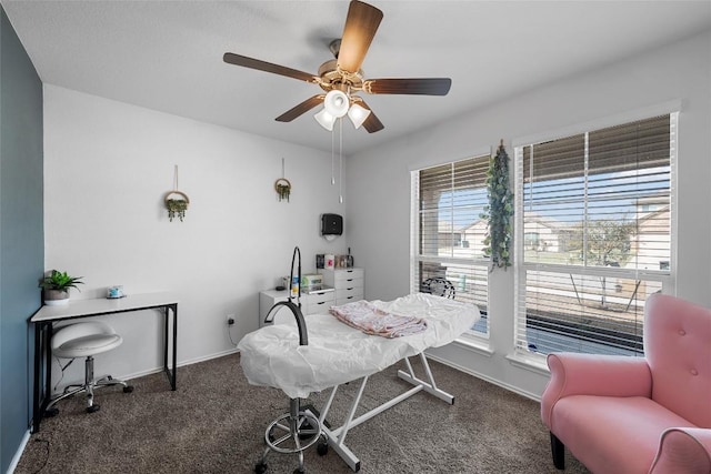 office with baseboards, carpet, and ceiling fan