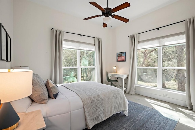 carpeted bedroom featuring a ceiling fan