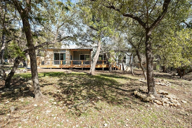 exterior space featuring a wooden deck