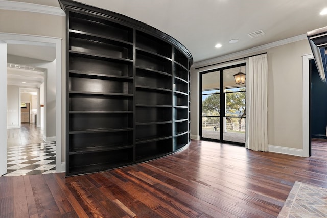 unfurnished room with visible vents, baseboards, ornamental molding, recessed lighting, and hardwood / wood-style flooring