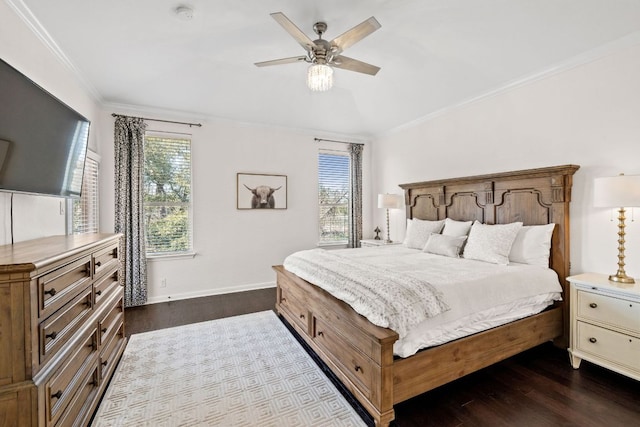 bedroom featuring multiple windows, crown molding, and dark wood-type flooring