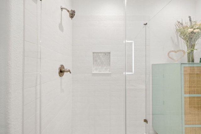 full bathroom featuring a stall shower