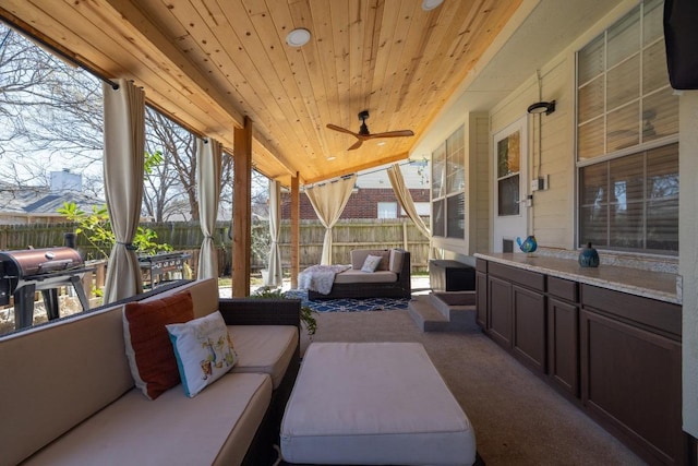 view of patio / terrace featuring an outdoor hangout area, a grill, ceiling fan, and fence