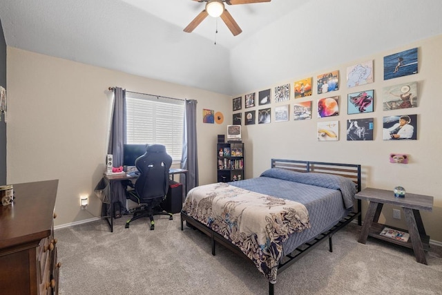 carpeted bedroom with baseboards, lofted ceiling, and a ceiling fan