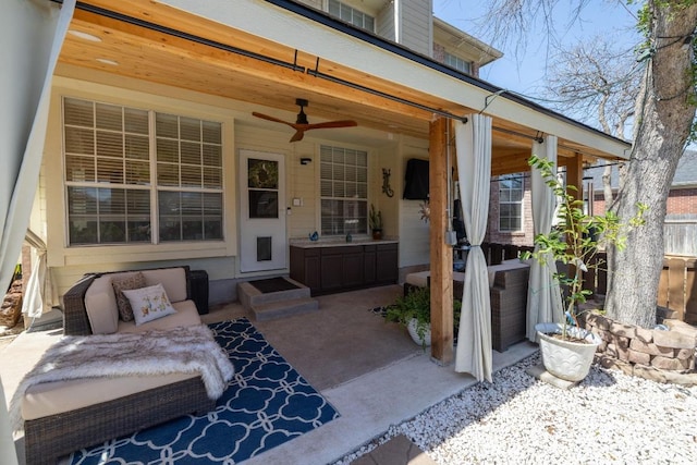 view of patio with ceiling fan