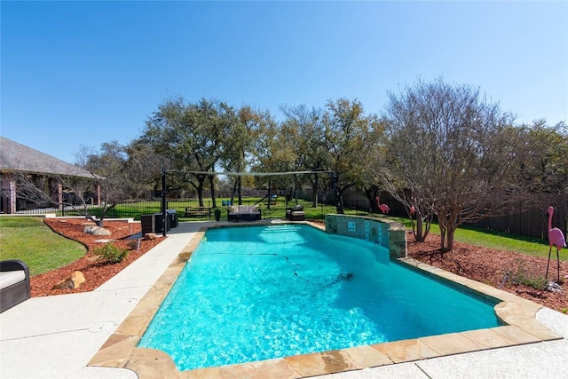 view of swimming pool featuring a fenced in pool, a lawn, and fence