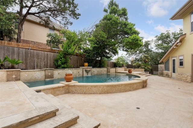 view of pool with a patio area, a fenced backyard, and a fenced in pool