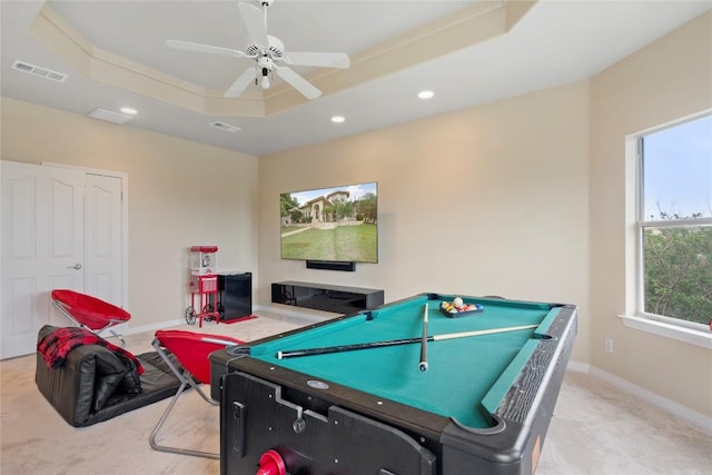 game room with visible vents, a raised ceiling, carpet, and baseboards