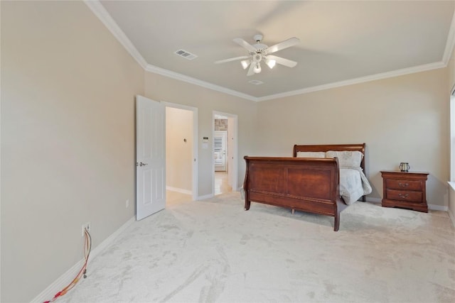 bedroom with a ceiling fan, baseboards, visible vents, carpet floors, and crown molding