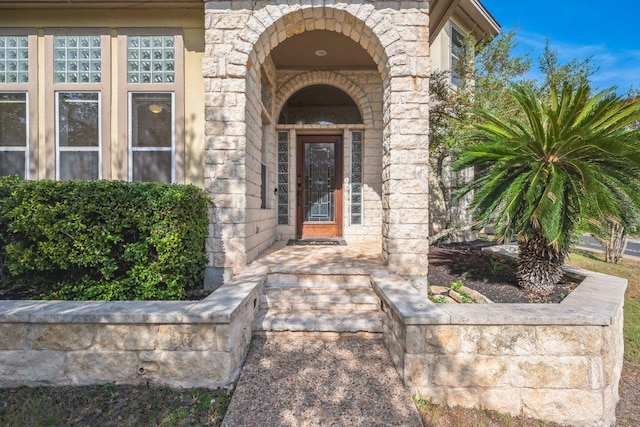 9907 Spicewood Mesa, Austin, TX 78759 - entrance to property with stone siding