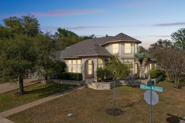 9907 Spicewood Mesa, Austin, TX 78759 - view of front of house featuring a lawn and a shingled roof