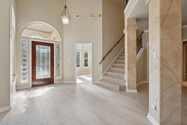 9907 Spicewood Mesa, Austin, TX 78759 - foyer entrance featuring stairway and a towering ceiling