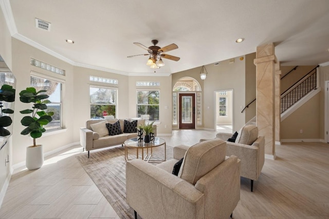9907 Spicewood Mesa, Austin, TX 78759 - living room featuring stairway, ceiling fan, recessed lighting, crown molding, and light wood-style floors