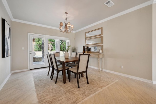 9907 Spicewood Mesa, Austin, TX 78759 - dining room with light wood finished floors, ornamental molding, and a chandelier