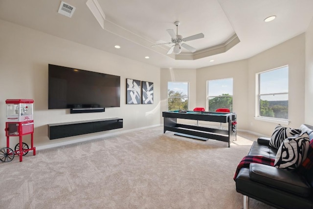 9907 Spicewood Mesa, Austin, TX 78759 - carpeted living area with a raised ceiling, ceiling fan, and recessed lighting