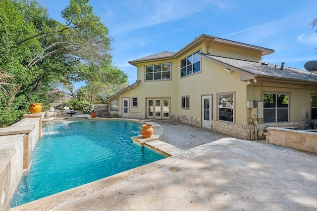 9907 Spicewood Mesa, Austin, TX 78759 - outdoor pool featuring french doors and a patio