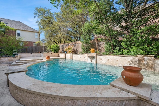 9907 Spicewood Mesa, Austin, TX 78759 - view of pool with a fenced backyard