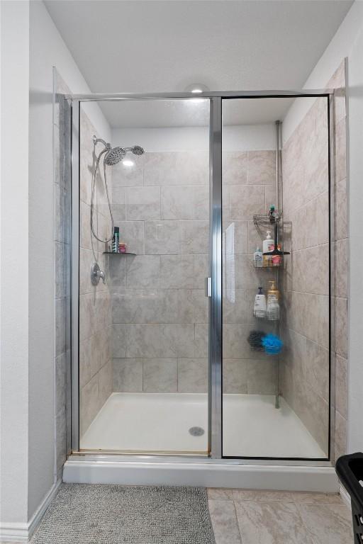 full bath featuring a stall shower