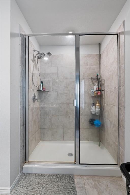 701 Taggart Trl, Jarrell, TX 76537 - bathroom featuring a shower stall
