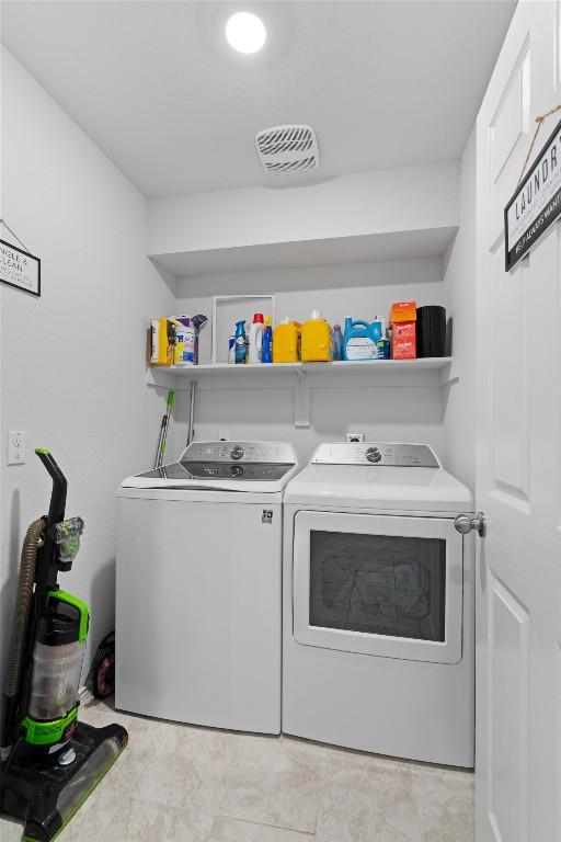 701 Taggart Trl, Jarrell, TX 76537 - laundry area featuring washer and clothes dryer