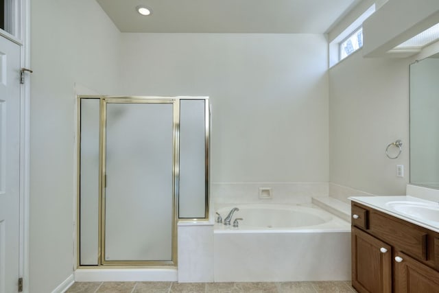 113 Yaupon Ln, Georgetown, TX 78633 - full bath with vanity, a shower stall, and a garden tub
